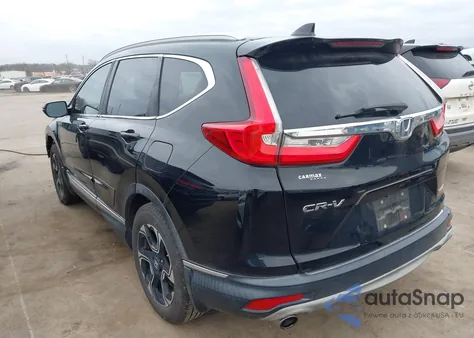 2017 Honda Cr-V Touring z USA, uszkodzony, nr VIN 2HKRW1H92HH512730